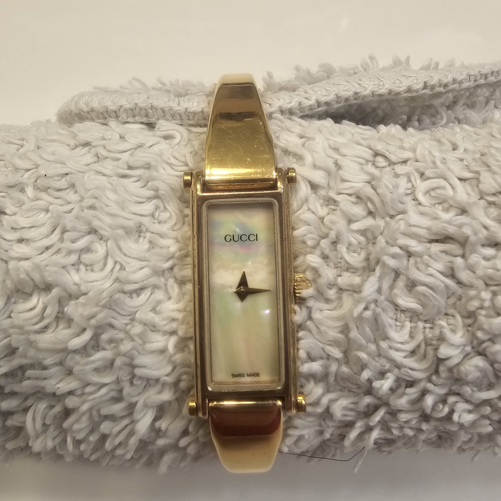 Vintage Gucci Gold Rectangular Watch with Iridescent Dial